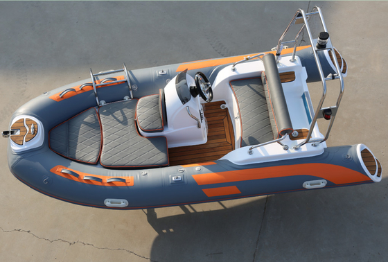 China 2022 creative design with removable fuel tank inflatable rib boat 13 ft rib390CL with teak floor supplier