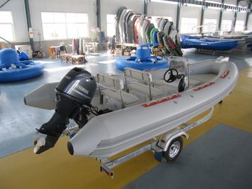China Fiberglass Hull Inflatable Rib Boat 18 Ft Sea Eagle Inflatable Boats With Bimini Top supplier